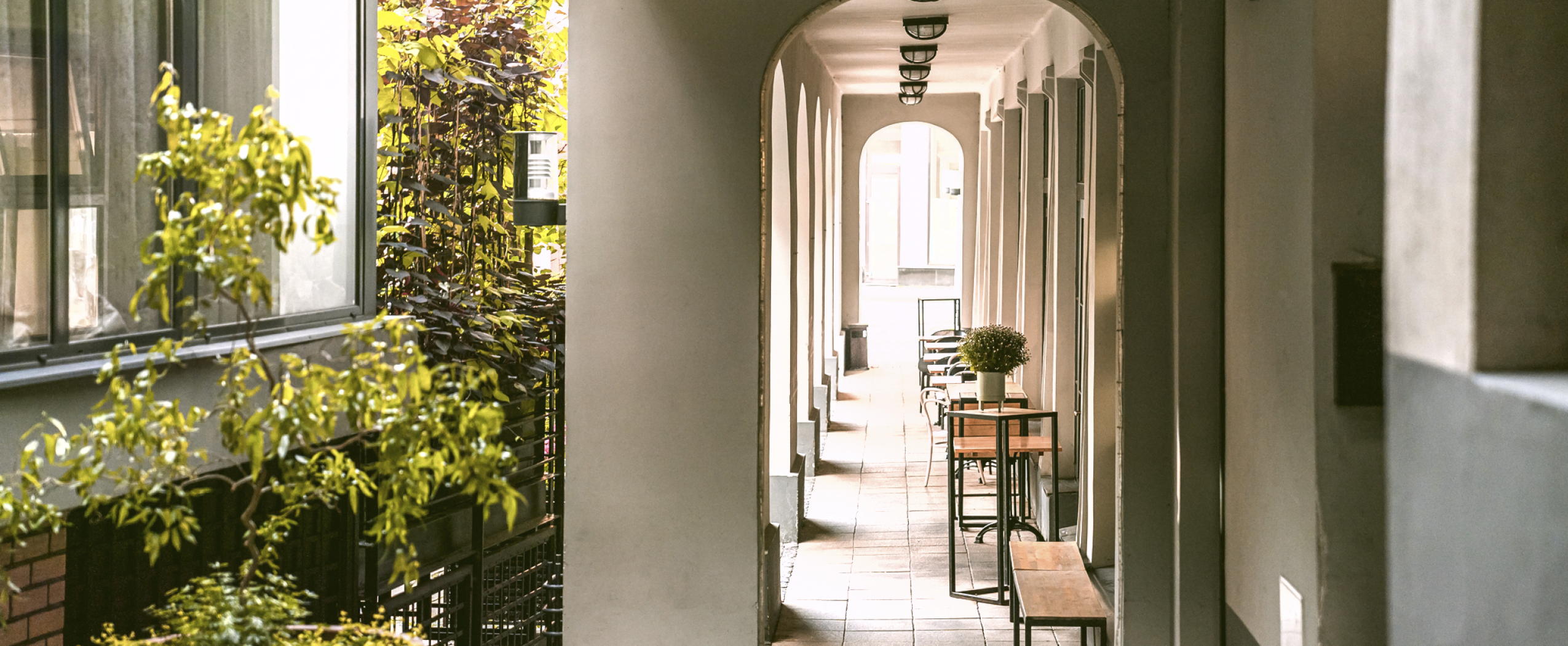 Cafés near the CENTRUS quarter serve éclairs, croissants, and coffee, offering a warm place to relax with friends in the heart of Riga.